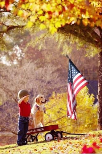Kid and Dog Solute the American Flag